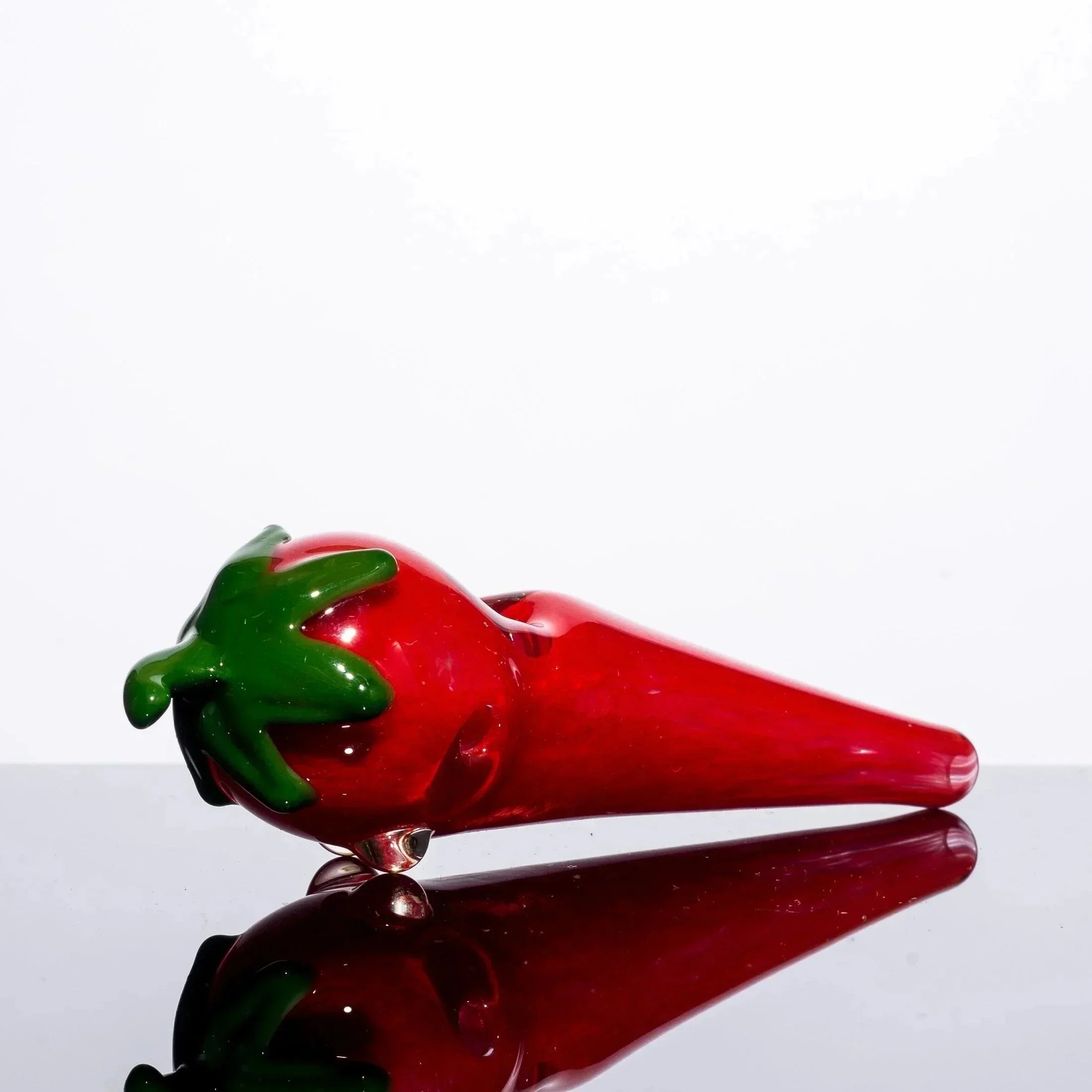 Red glass chili pepper pipe with green stem, heady glass art for smoke shop collection