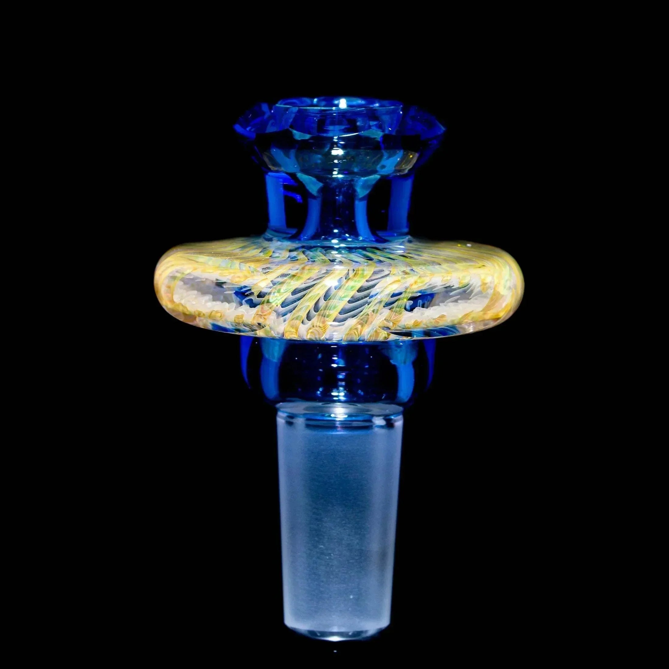 Light cobalt blue 14mm glass slide with intricate yellow and white swirl design
