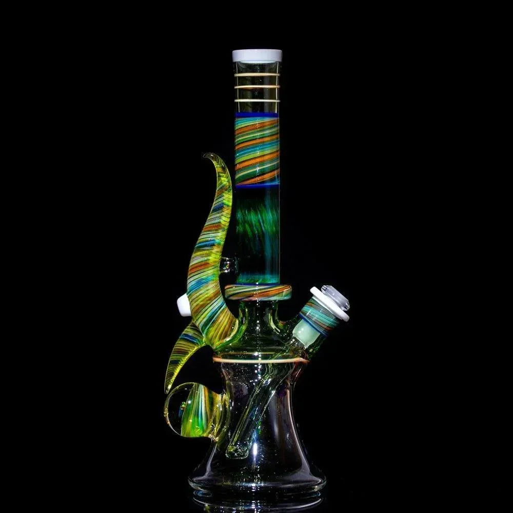 Colorful striped heady glass bong with swirling green, blue, and orange patterns on black background