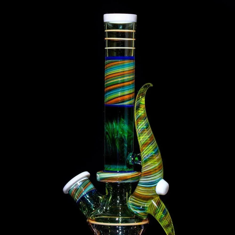 Colorful striped glass bong with green swirls and white accents, heady glass art piece