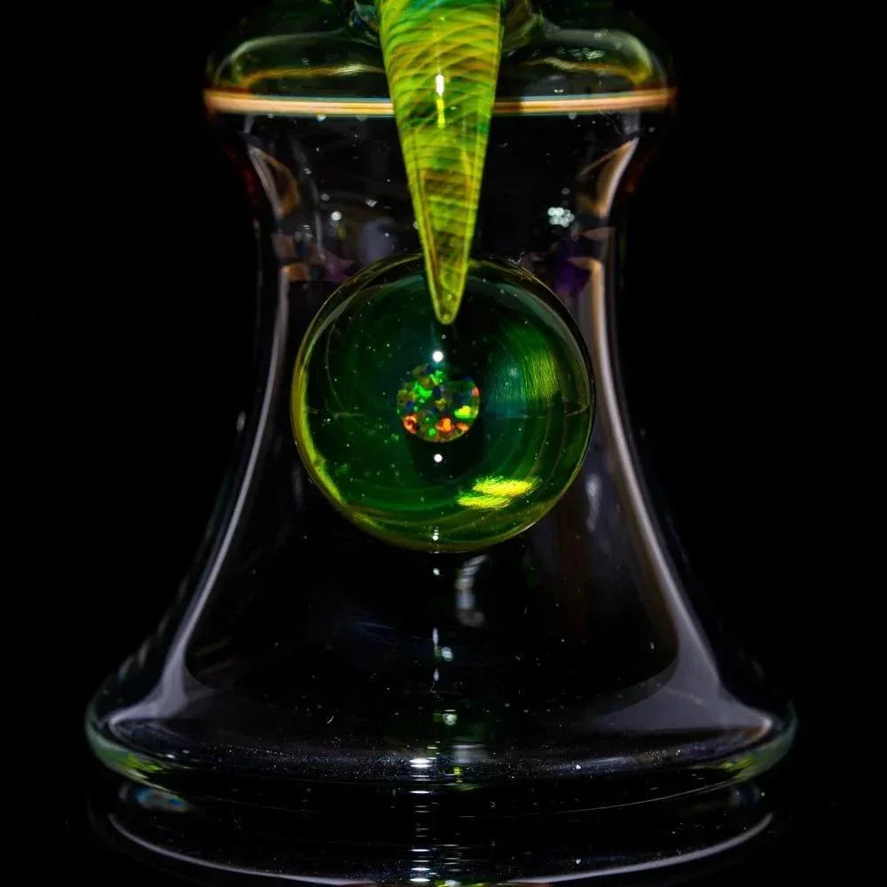 Heady glass bong with green swirls and dichroic orb, premium smoke shop accessory