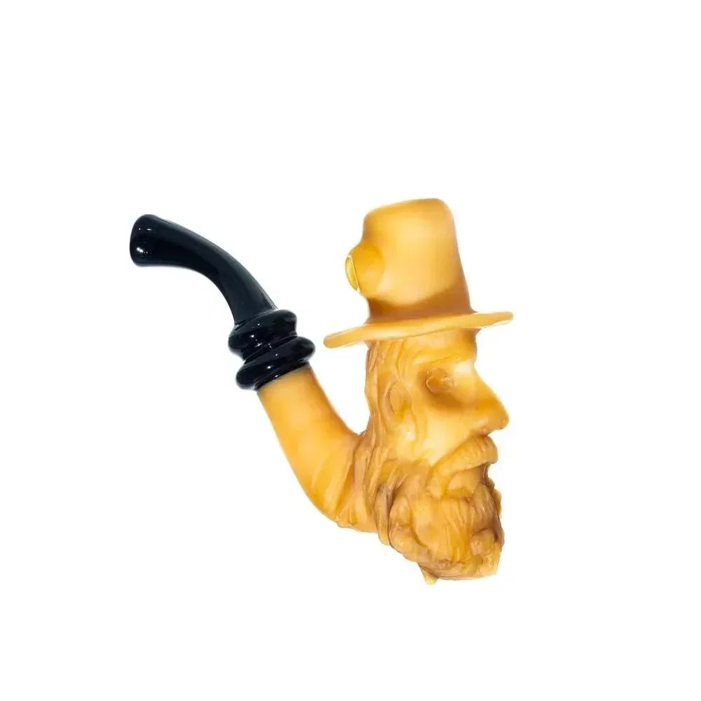 Handcrafted glass pipe shaped like an old man's bearded face with a hat, black stem