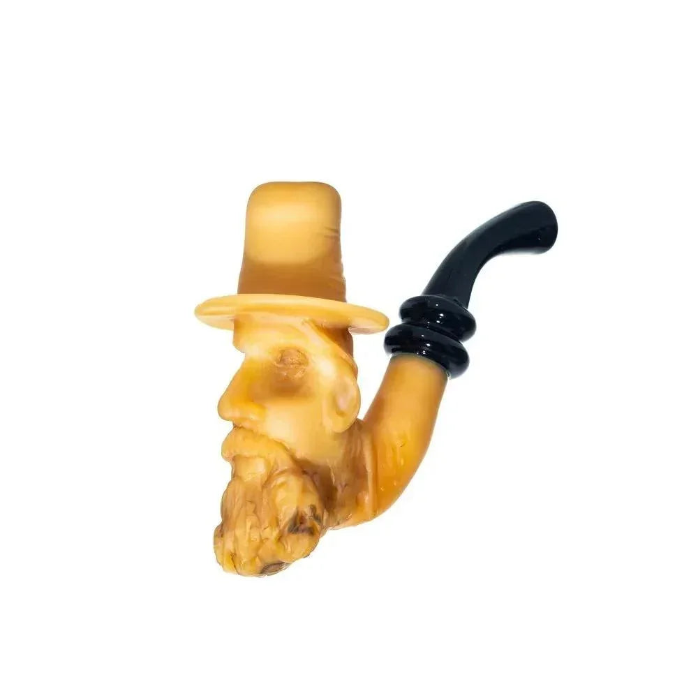Handcrafted glass pipe shaped like an old man's head with a hat and beard, novelty smoking accessory