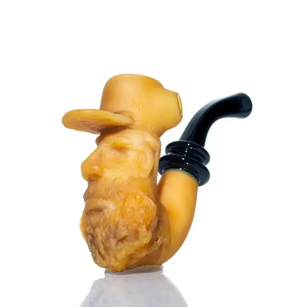 Handcrafted glass pipe shaped like an old man's bearded face with a hat and black stem