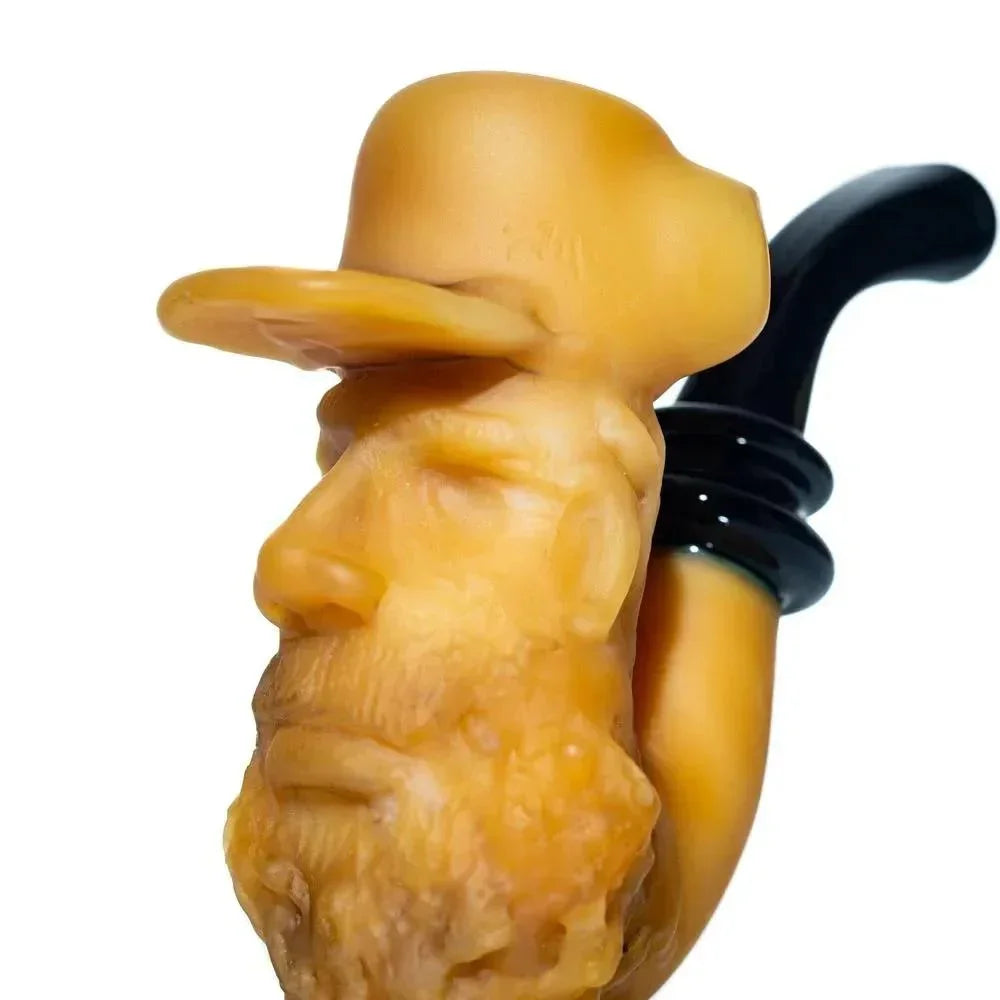 Hand-carved tobacco pipe with bearded man's head and hat, curved black mouthpiece
