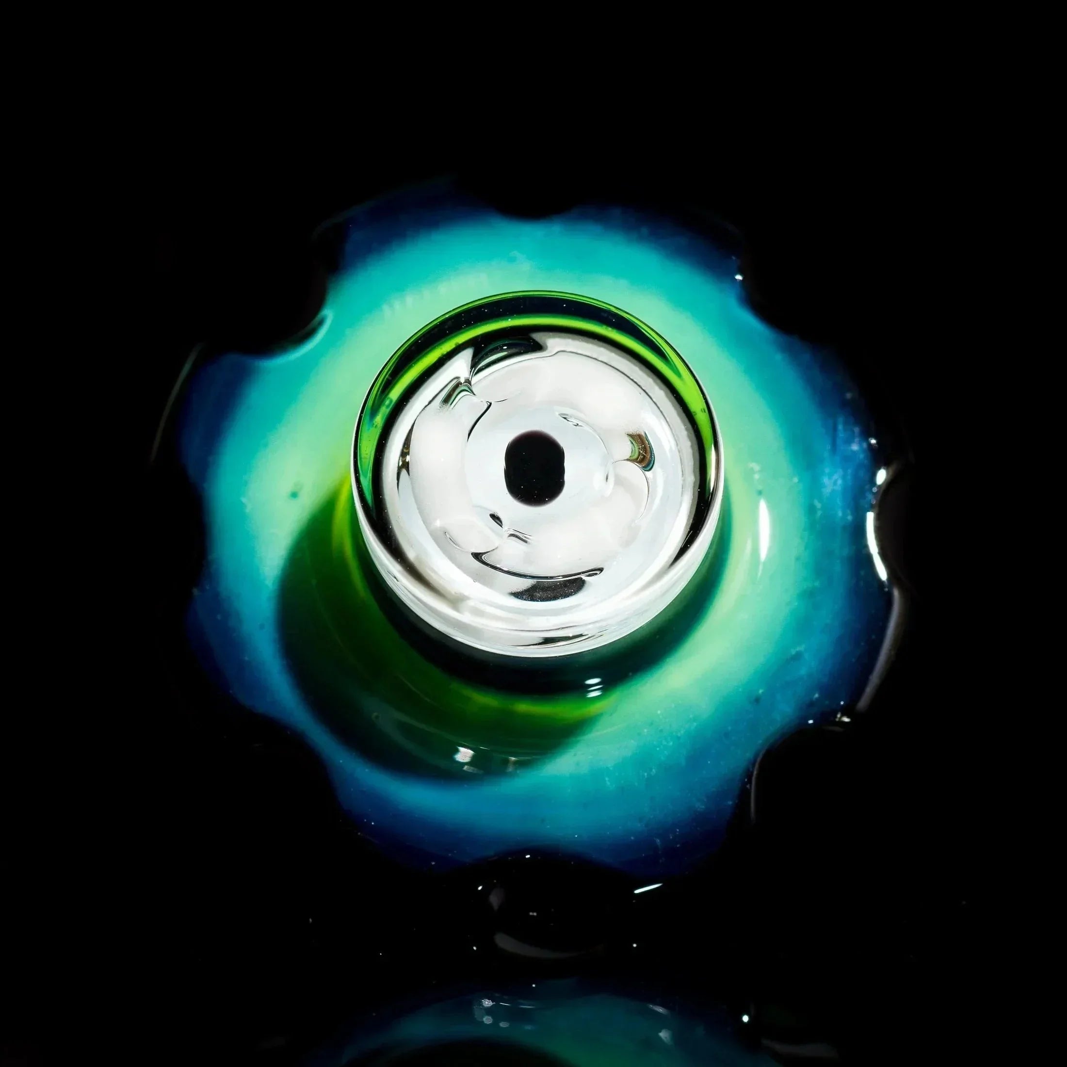 Vibrant blue and green heady glass bowl with swirl design, showcasing artisan craftsmanship for smoking accessories.