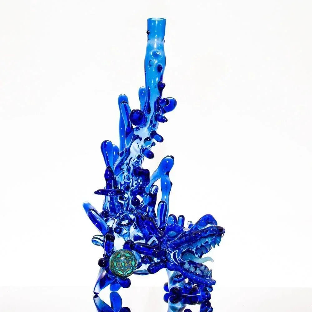 Blue dragon-themed heady glass bong with intricate details and green accent bead