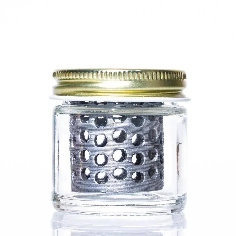 Glass jar with metal screw-on lid and perforated metal cylinder inside, for cleaning glass accessories.
