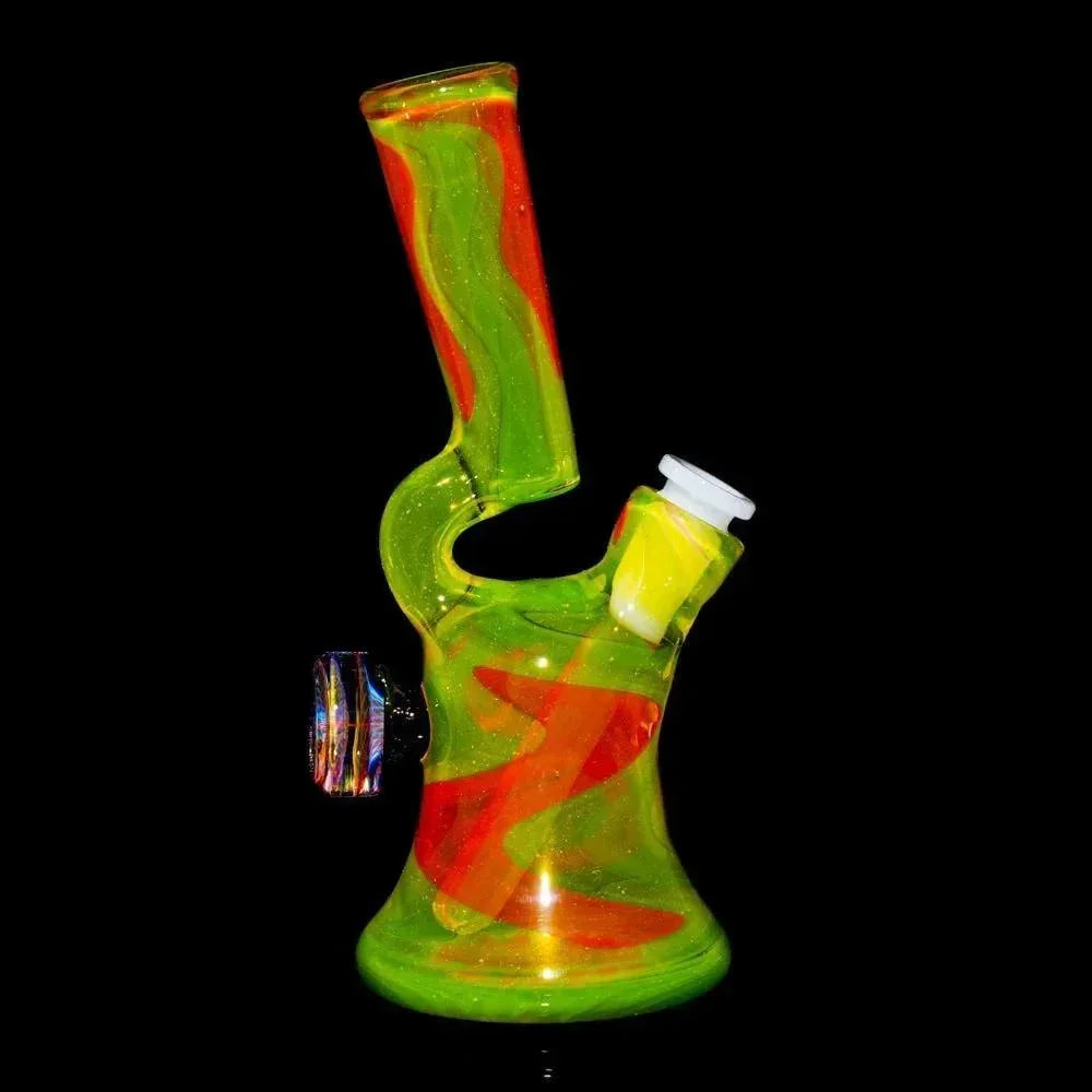 Hand-blown glass water pipe with vibrant lime green and orange swirl design on black background.