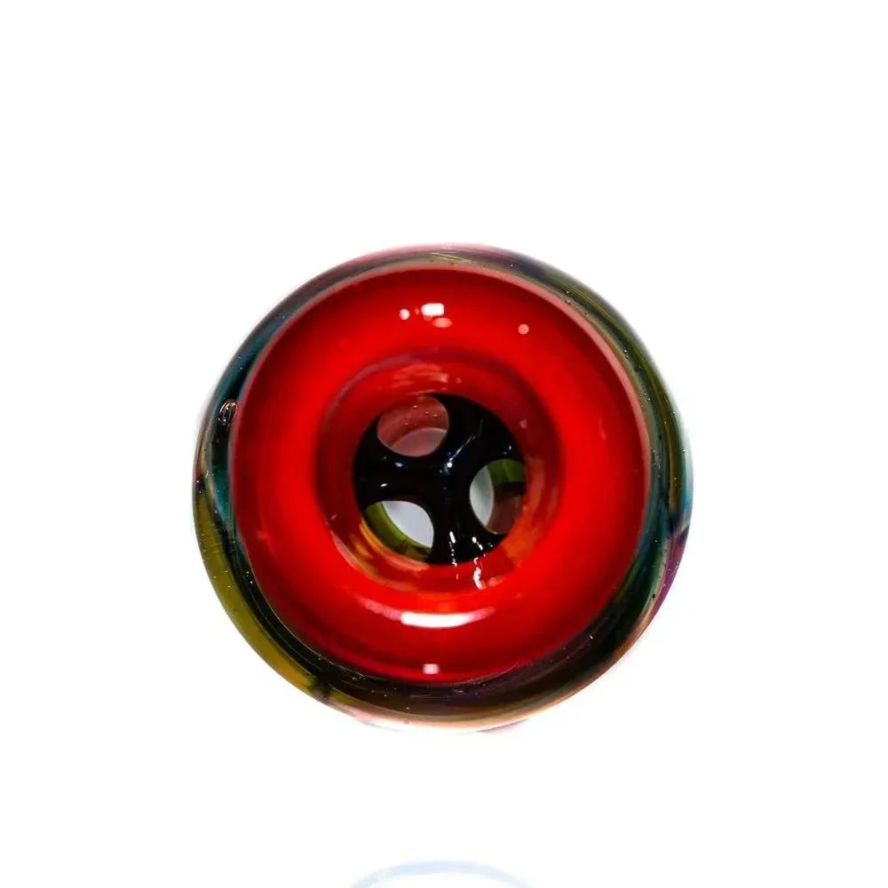 Close-up of colorful handcrafted glass pipe with vibrant red accents and artistic design