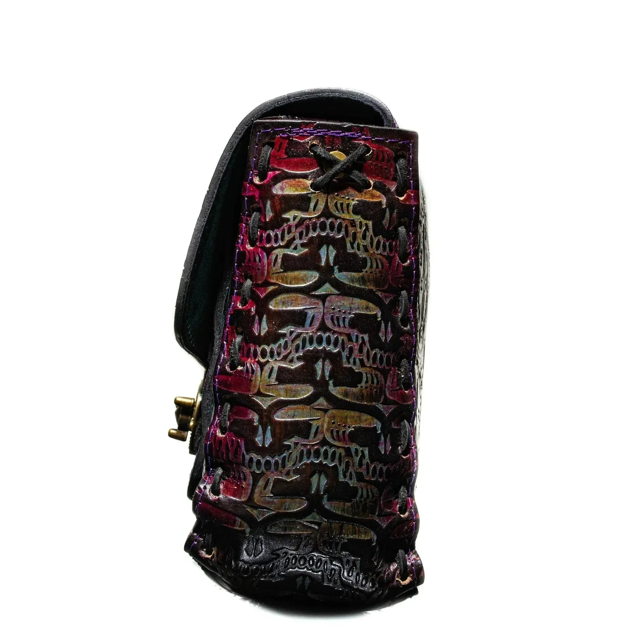 Side view of a leather bag with intricate, colorful embossed pattern on white background
