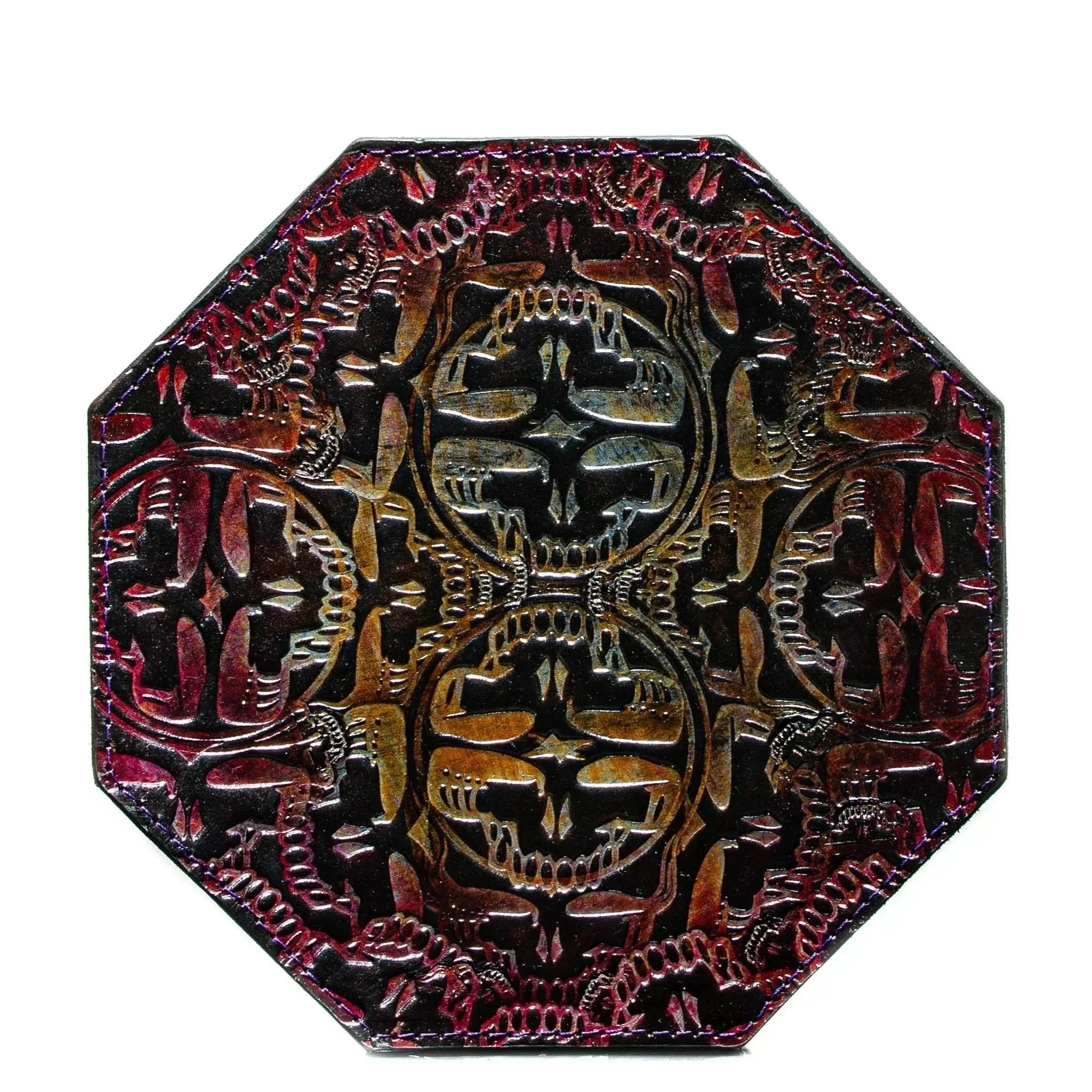 Octagonal leather side bag with intricate embossed pattern and multi-tone finish