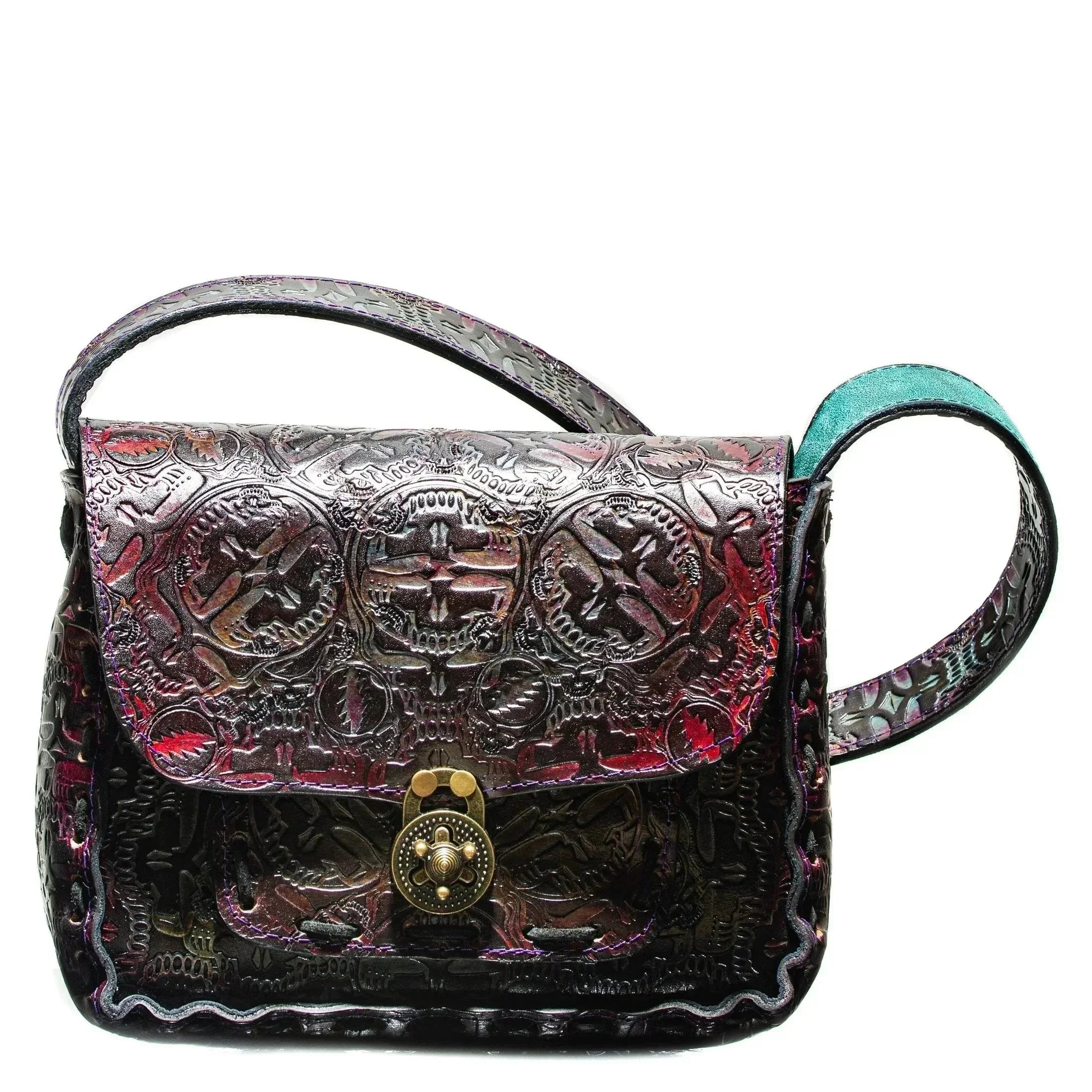 Handmade embossed leather side bag with ornate patterns and brass clasp