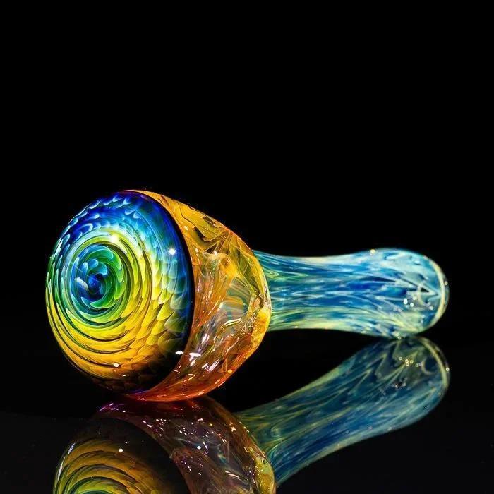 Vibrant spiral glass pipe with rainbow swirls, heady glass art for smoking accessories
