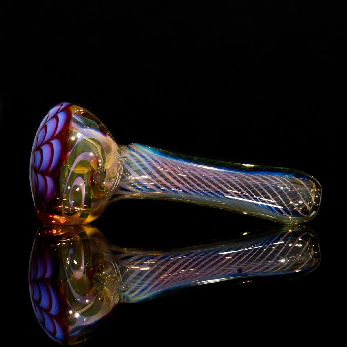 Colorful hand-blown glass pipe with swirls and stripes, reflective surface, black background