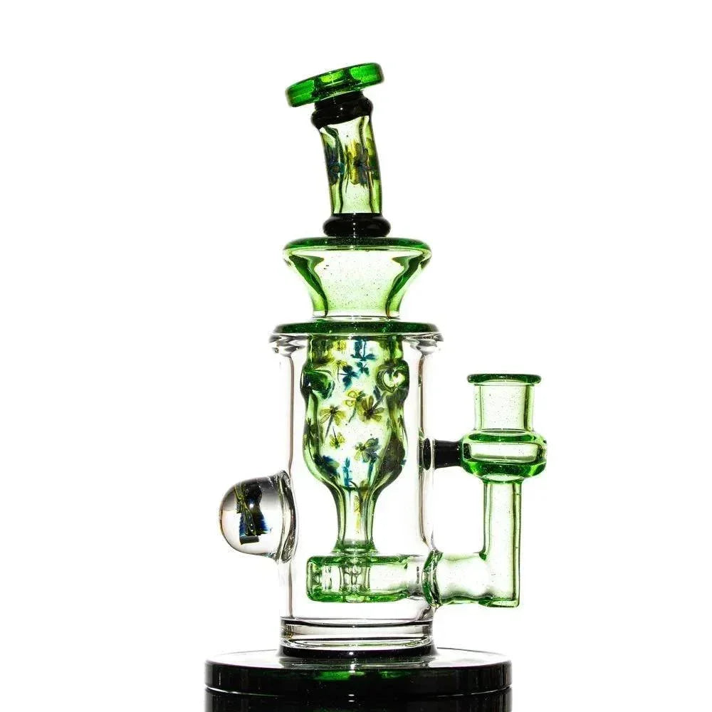 Green and clear glass water pipe with floral patterns and artistic accents