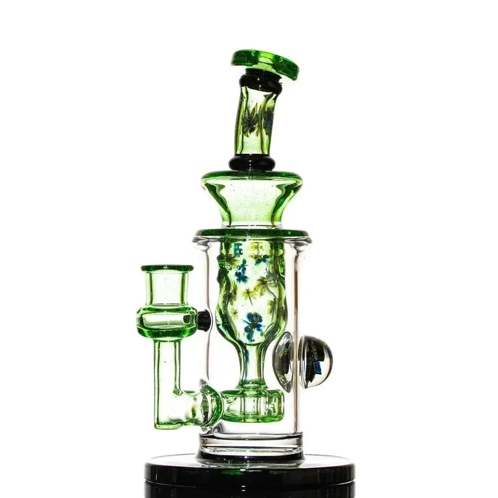 Clear and green glass water pipe with floral accents, artistic heady glass design