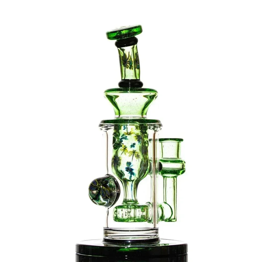 Green and clear glass water pipe with floral designs, heady glass art piece