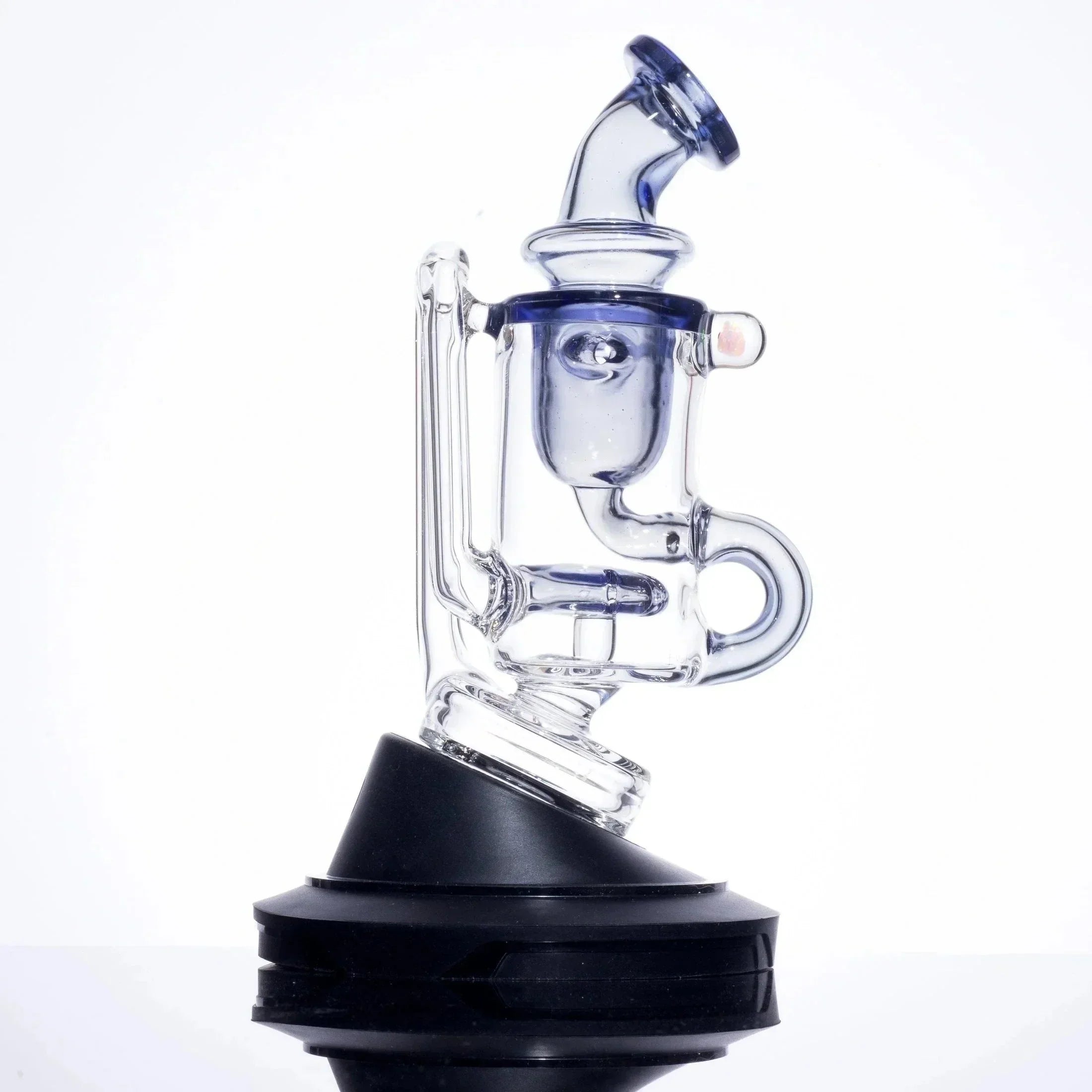 Clear glass bong with blue accents and black base, ideal for heady glass collectors