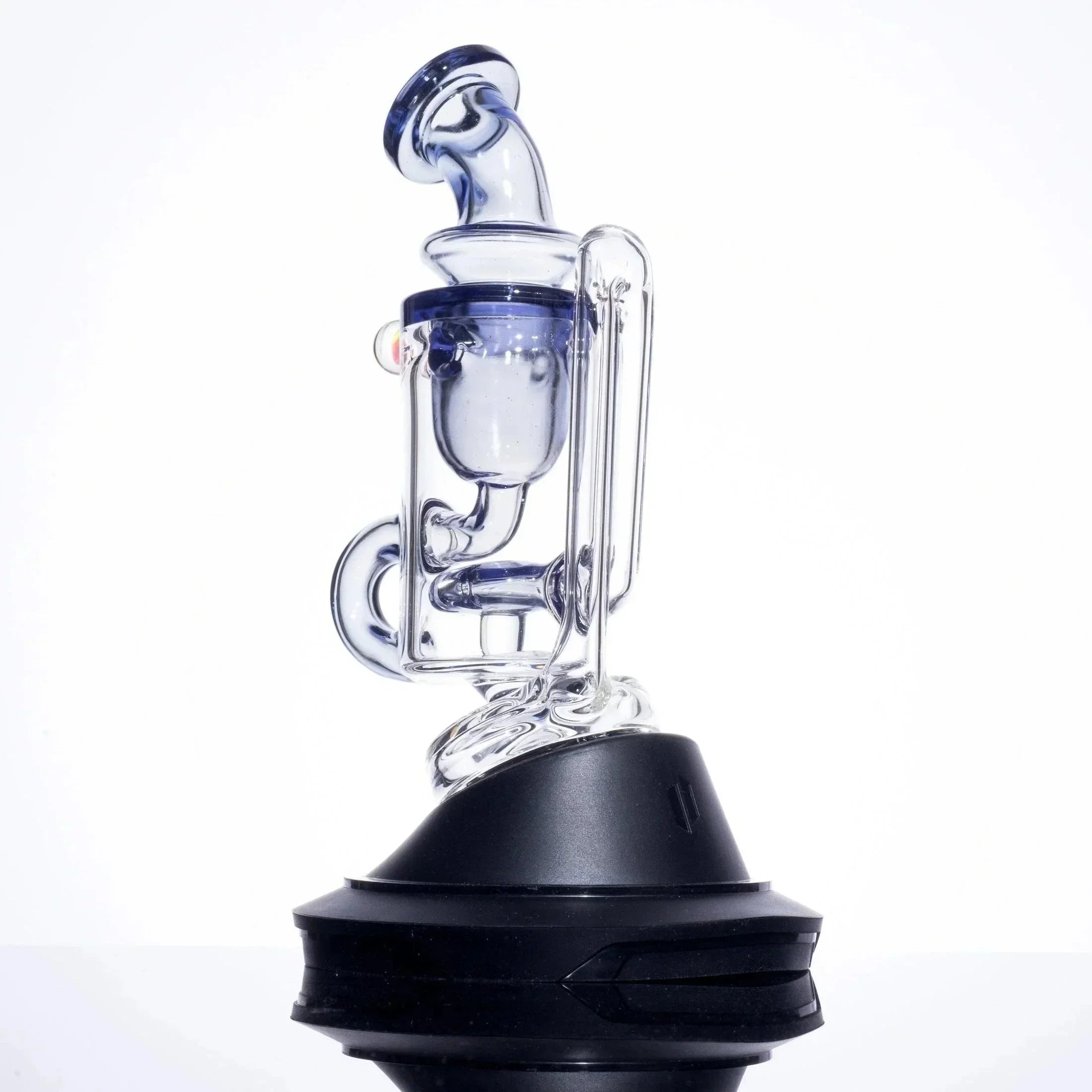 Clear glass bong with blue accents and black base, featuring intricate percolator design for smooth hits.