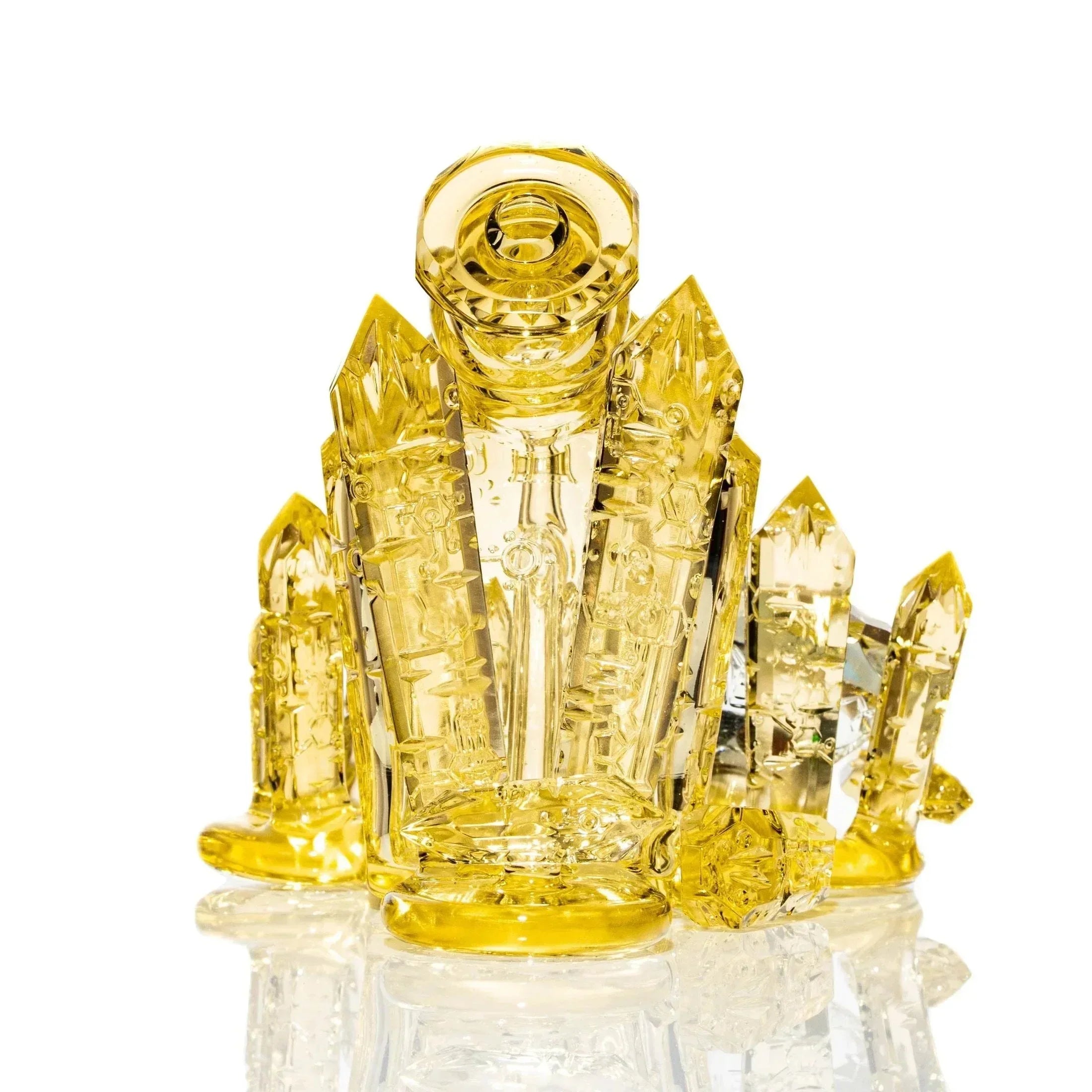 Yellow crystal-themed glass water pipe with intricate geometric details on a white background