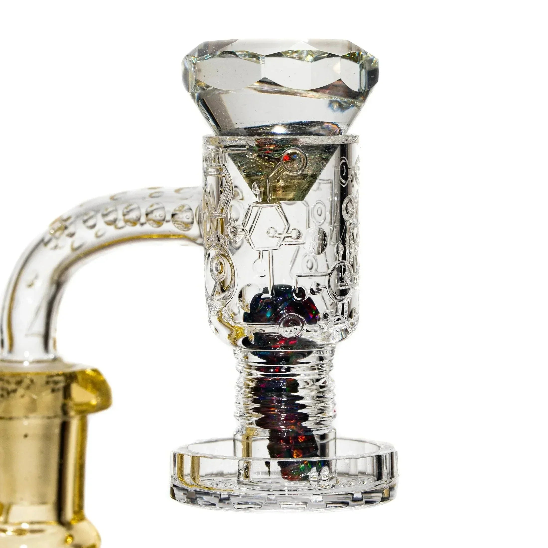 Intricately designed quartz banger with crystal top and engraved patterns for vaporizer rig