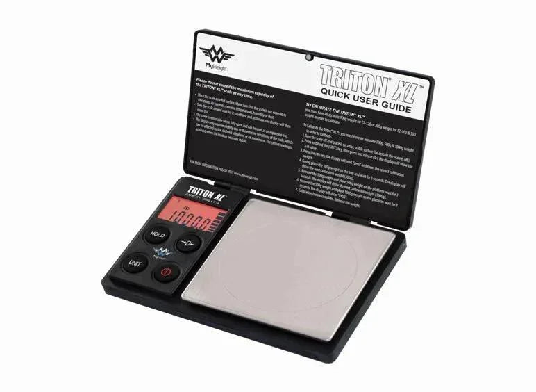 Digital pocket scale with LCD screen, stainless steel weighing platform, and open user guide lid.