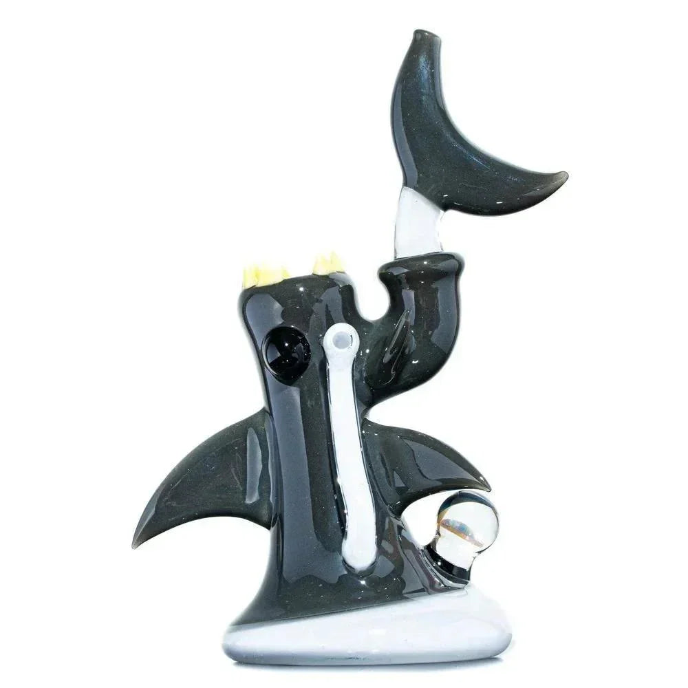 Hand-blown glass shark-shaped bubbler with black fins and unique artistic details.
