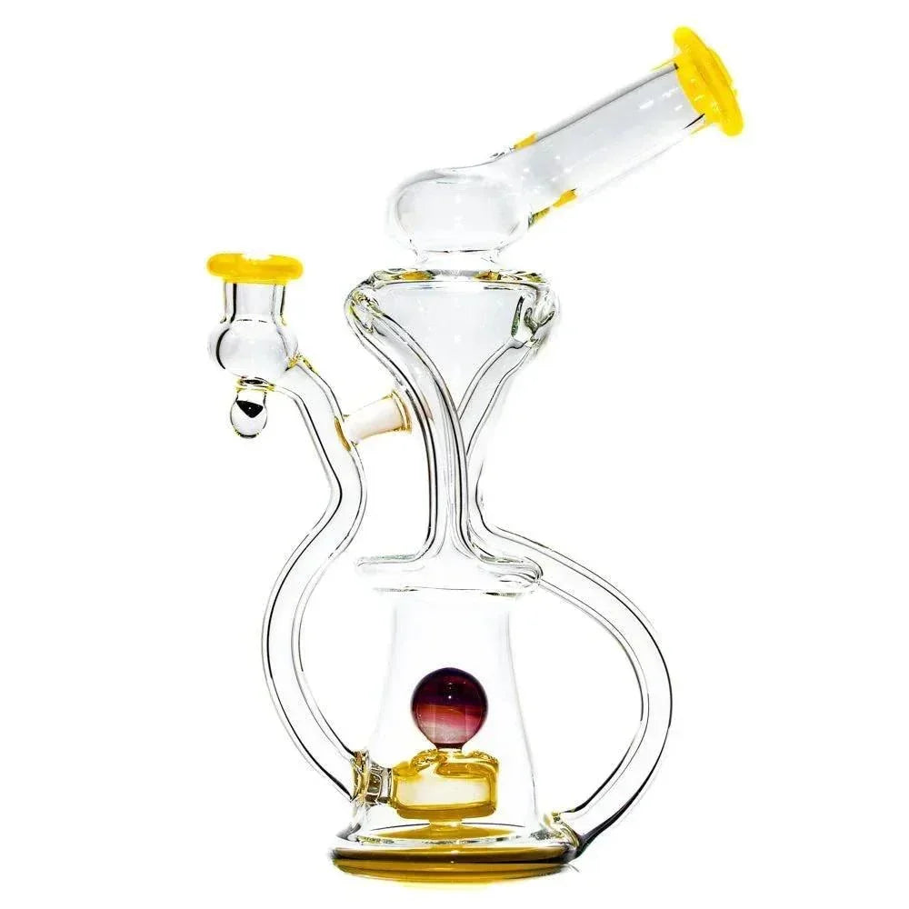 Clear glass dual uptake recycler water pipe with yellow accents and decorative marble.