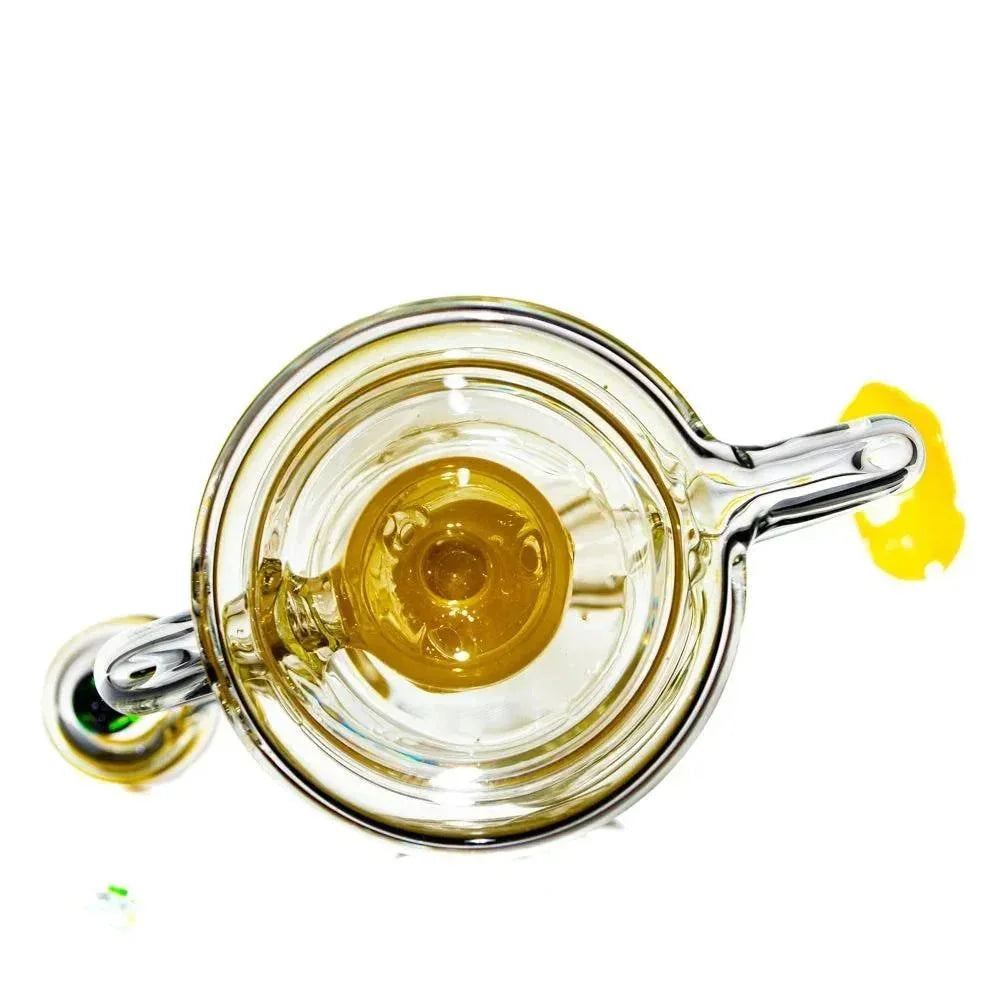 Top view of a dual uptake glass recycler with yellow accented chambers and clear tubing.