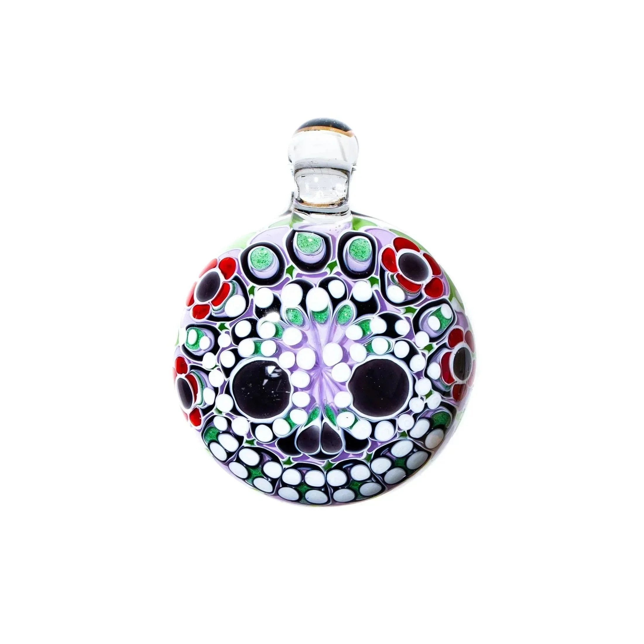 Colorful glass sugar skull pendant with red, green, and black dot stack design