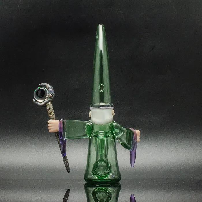 Green glass wizard bong with purple accents and detailed staff design