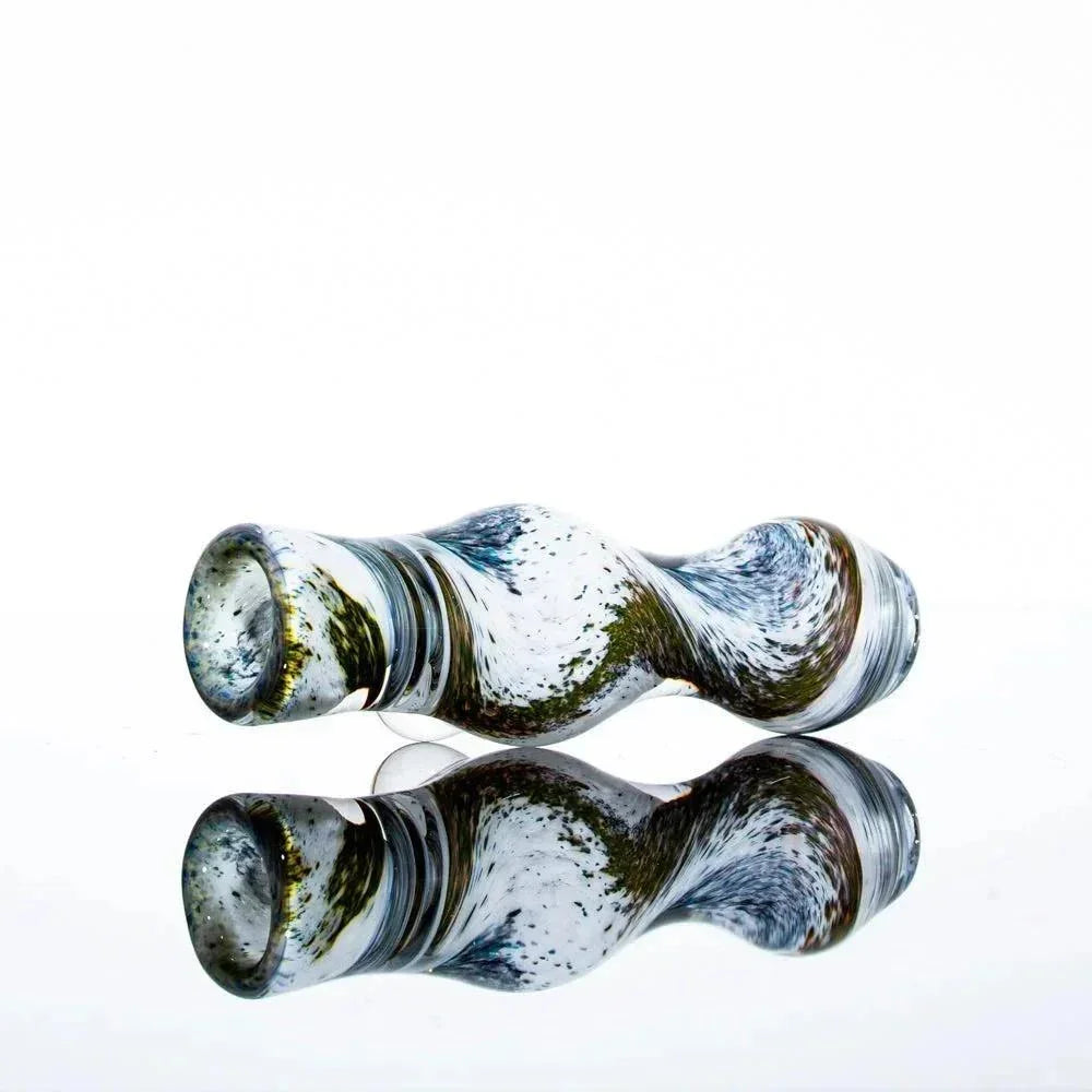 Green and white frit glass chillum pipe with textured twists, displayed on a reflective surface