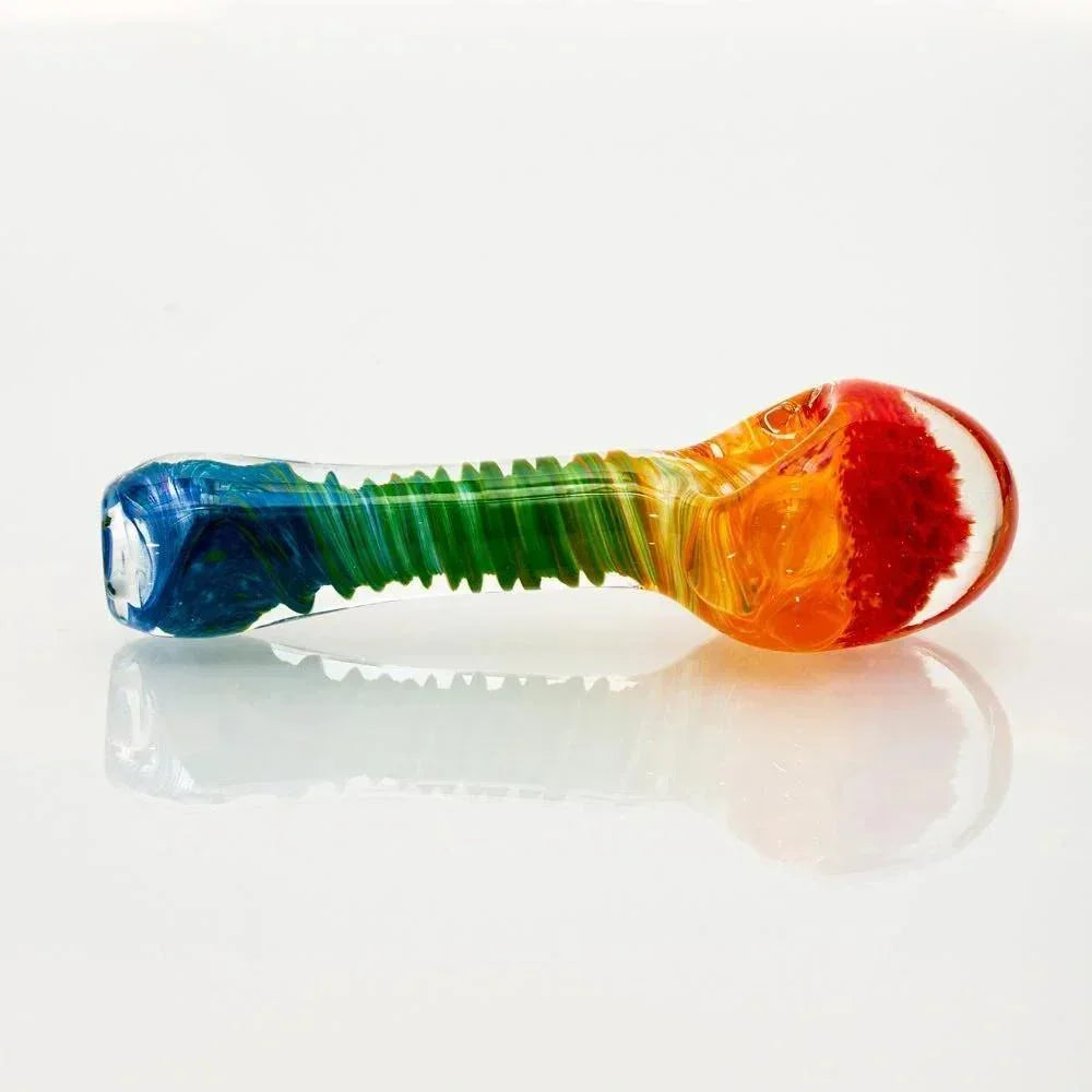 Colorful rainbow frit honeycomb glass spoon pipe on white background
