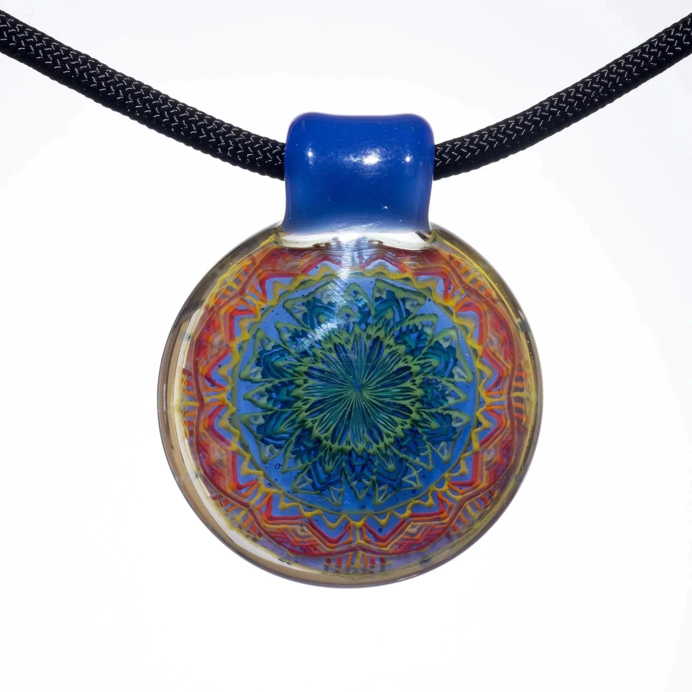 Colorful glass pendant with intricate mandala pattern on a braided black cord necklace