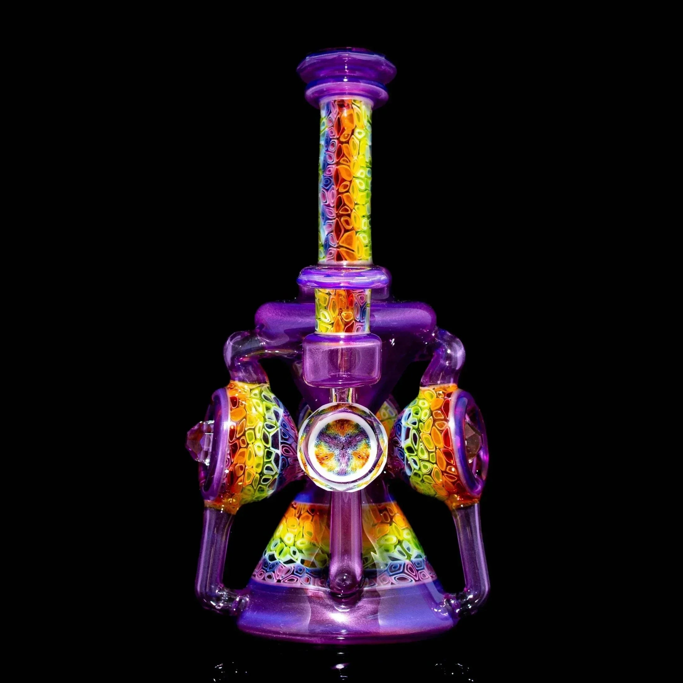 Colorful heady glass water pipe with vibrant rainbow patterns and intricate design on black background