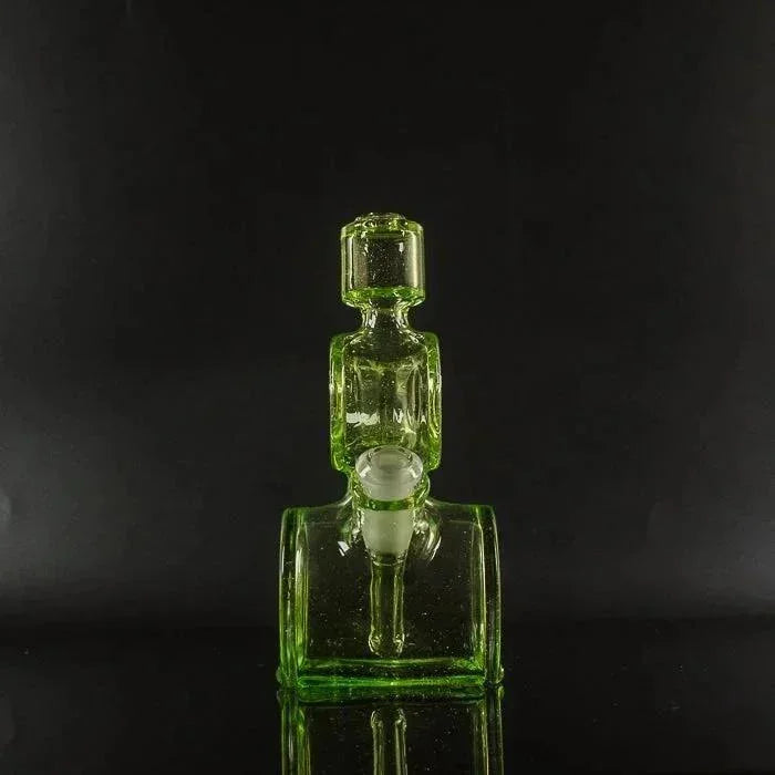 Vibrant green glass pipe with geometric design, ideal for heady glass collectors and vaporizer enthusiasts.