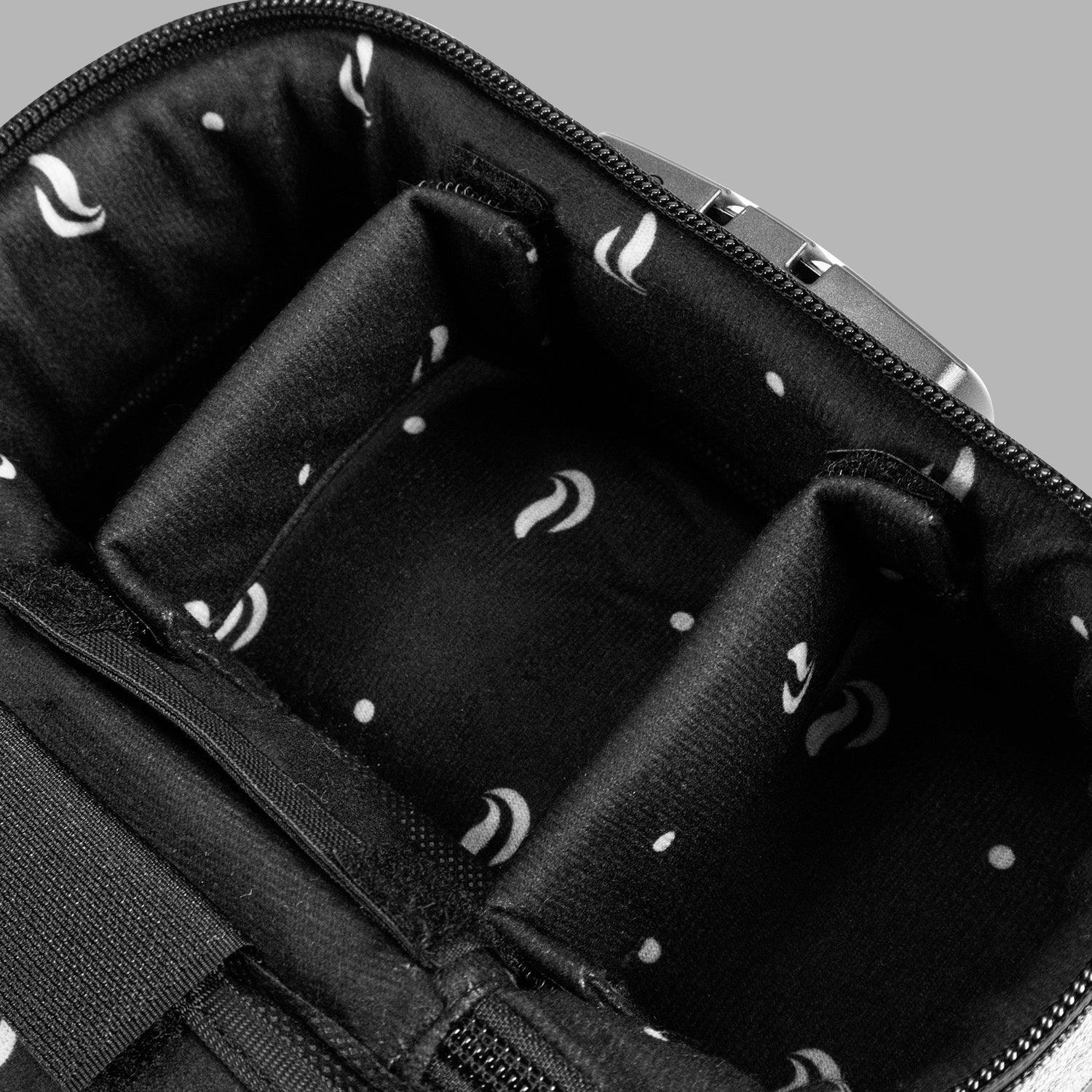 Black zippered carrying case with soft padded dividers for smoking accessories