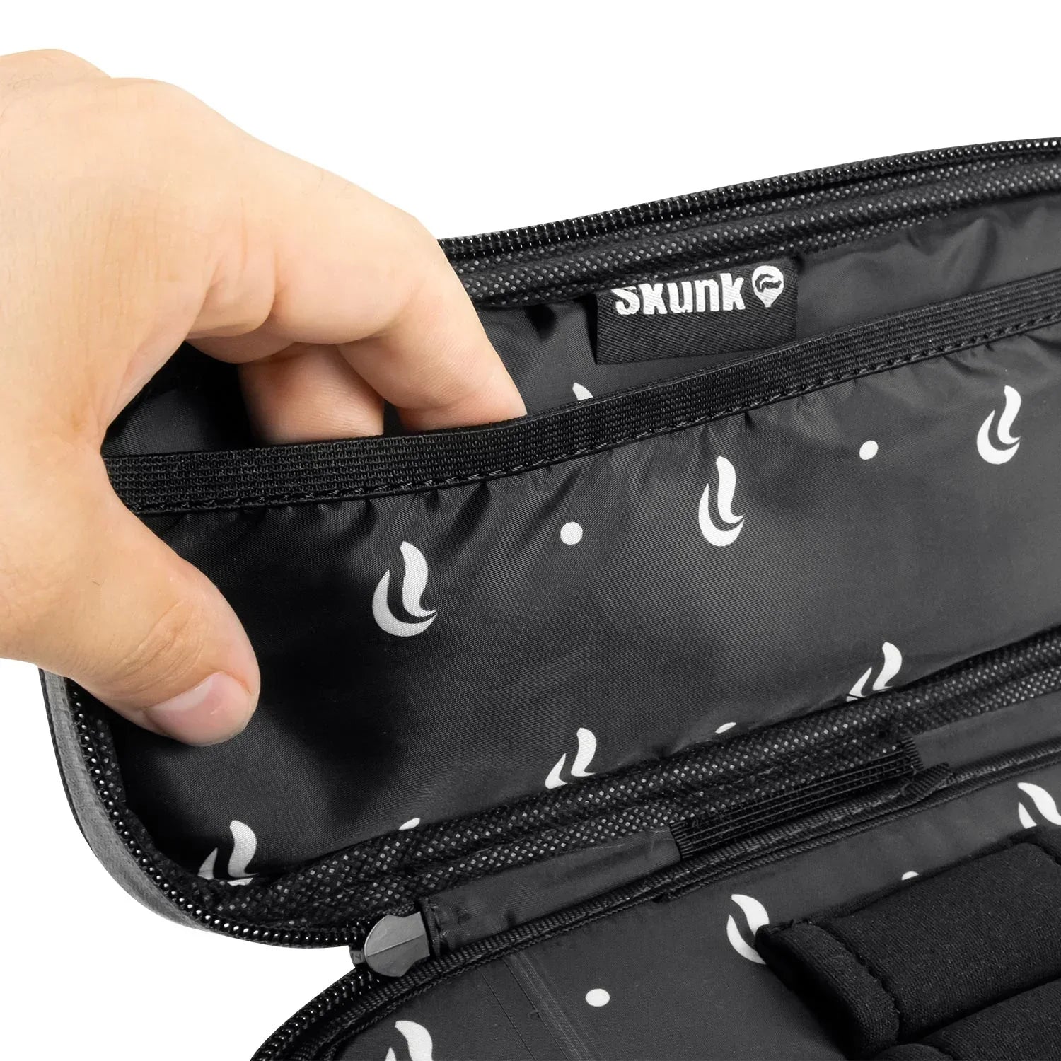 Hand opening black Skunk padded storage case with zipper and printed logo interior