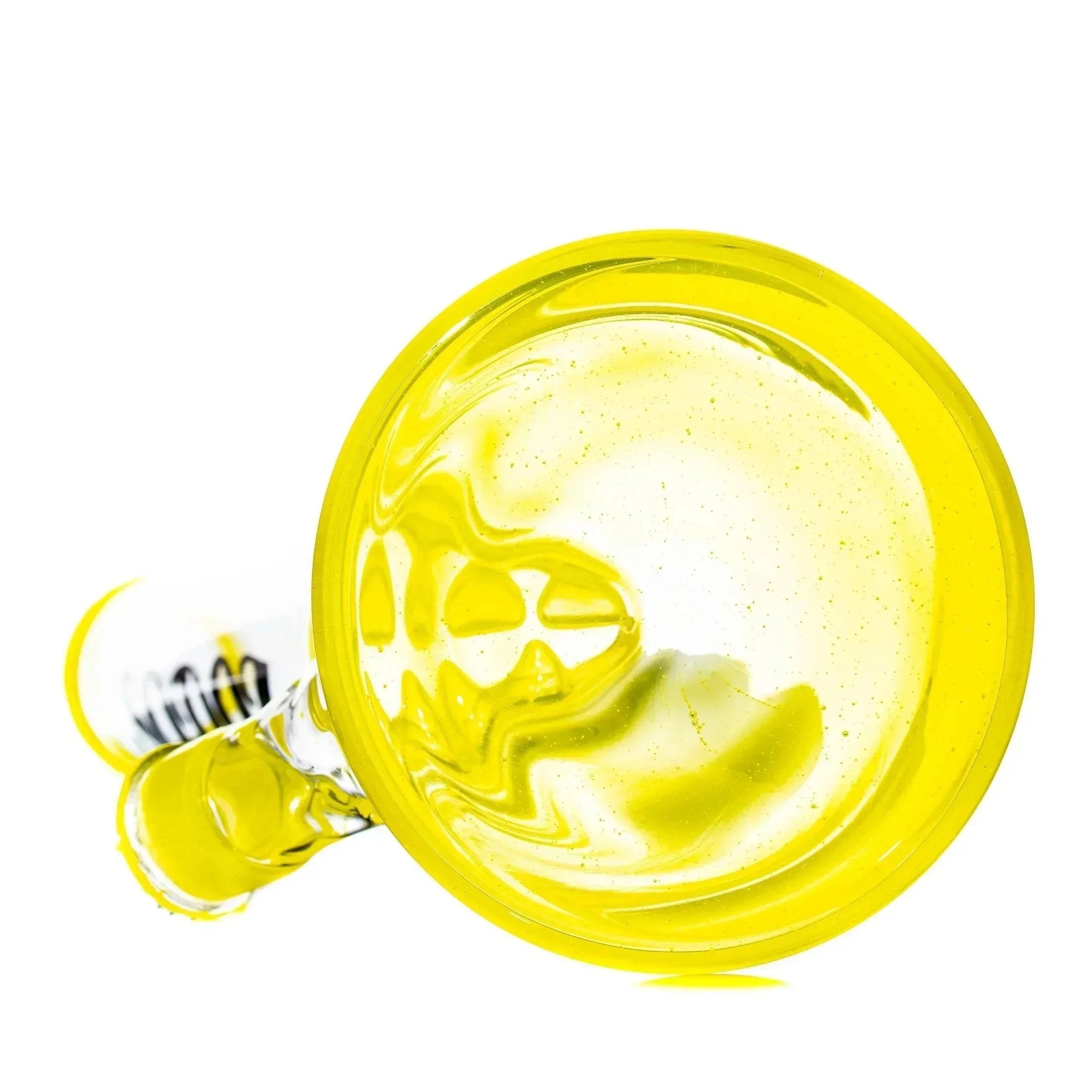 Yellow and black glass water pipe with clear accents, viewed from above on white background