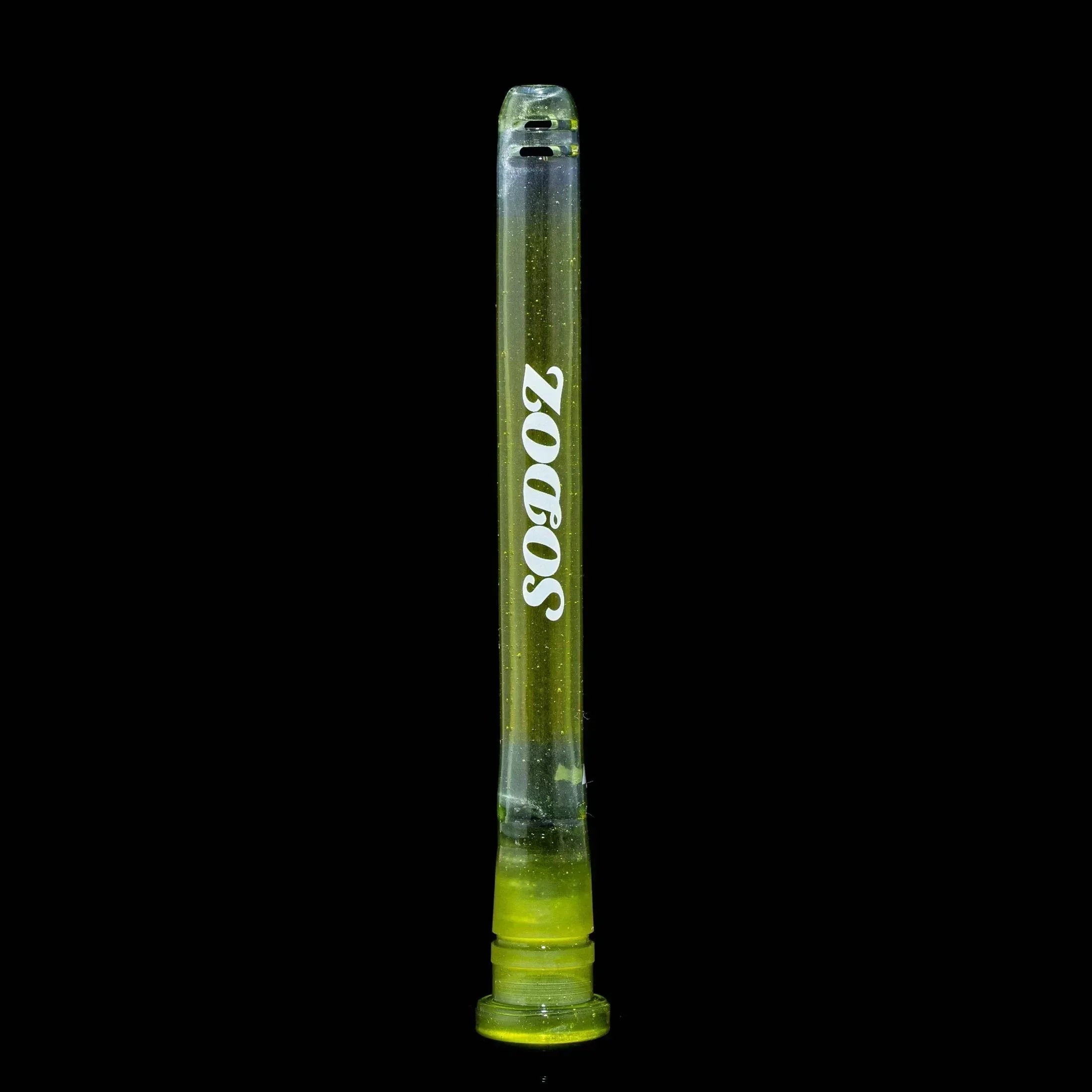 Green apple SODOZ glass chillum one hitter smoking accessory on black background