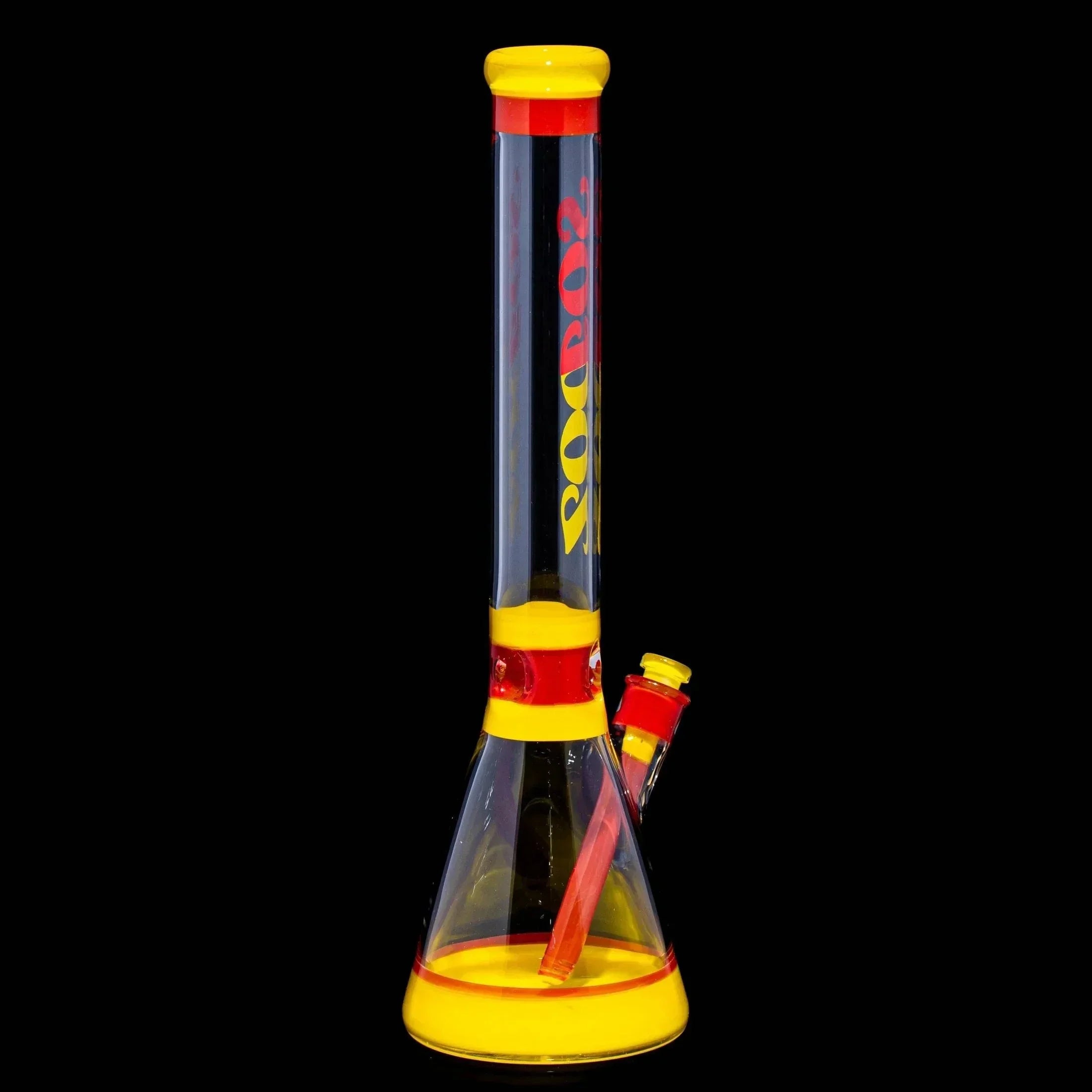 Clear glass beaker bong with red and yellow accents on a black background.