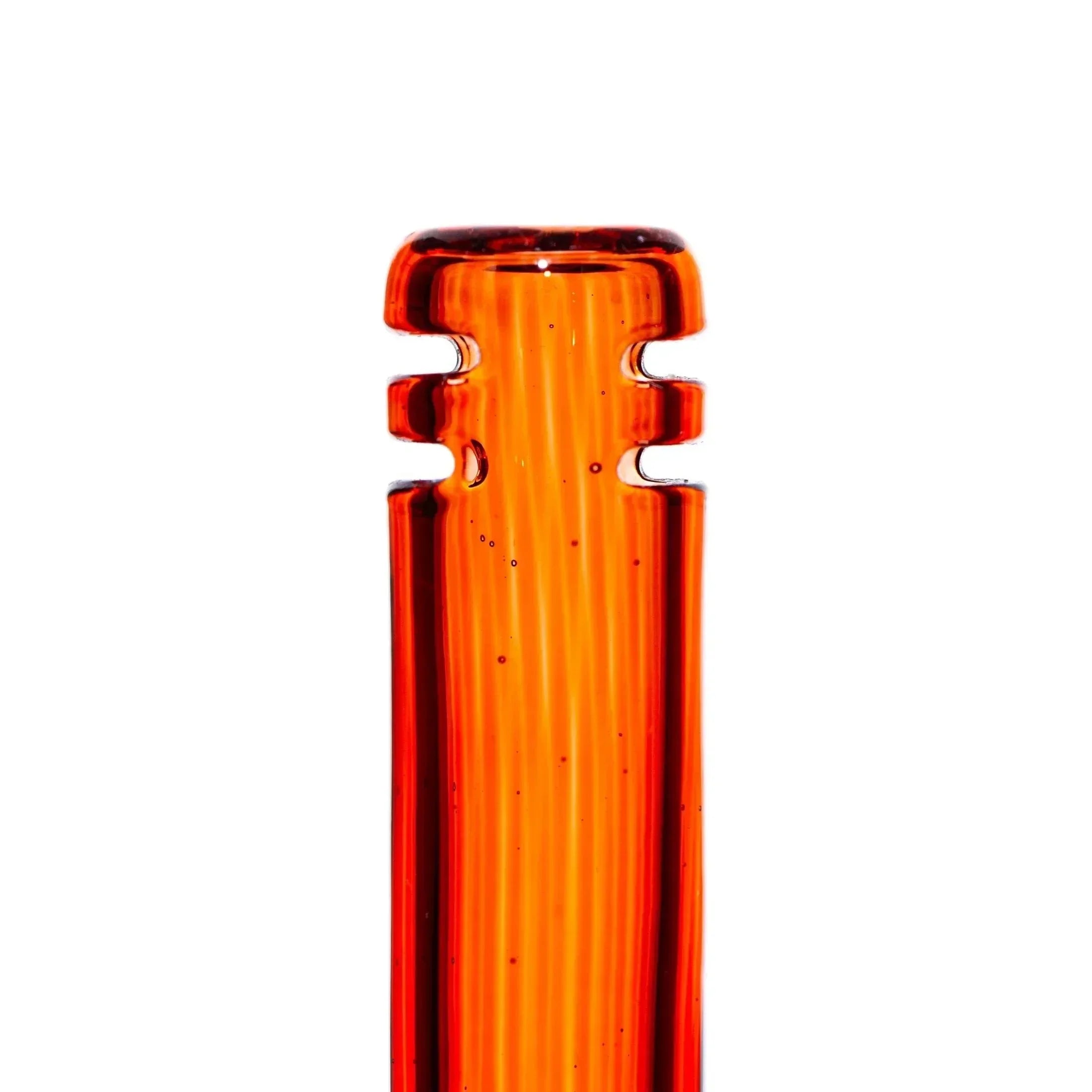 Amber glass pipe mouthpiece with dual notches on white background