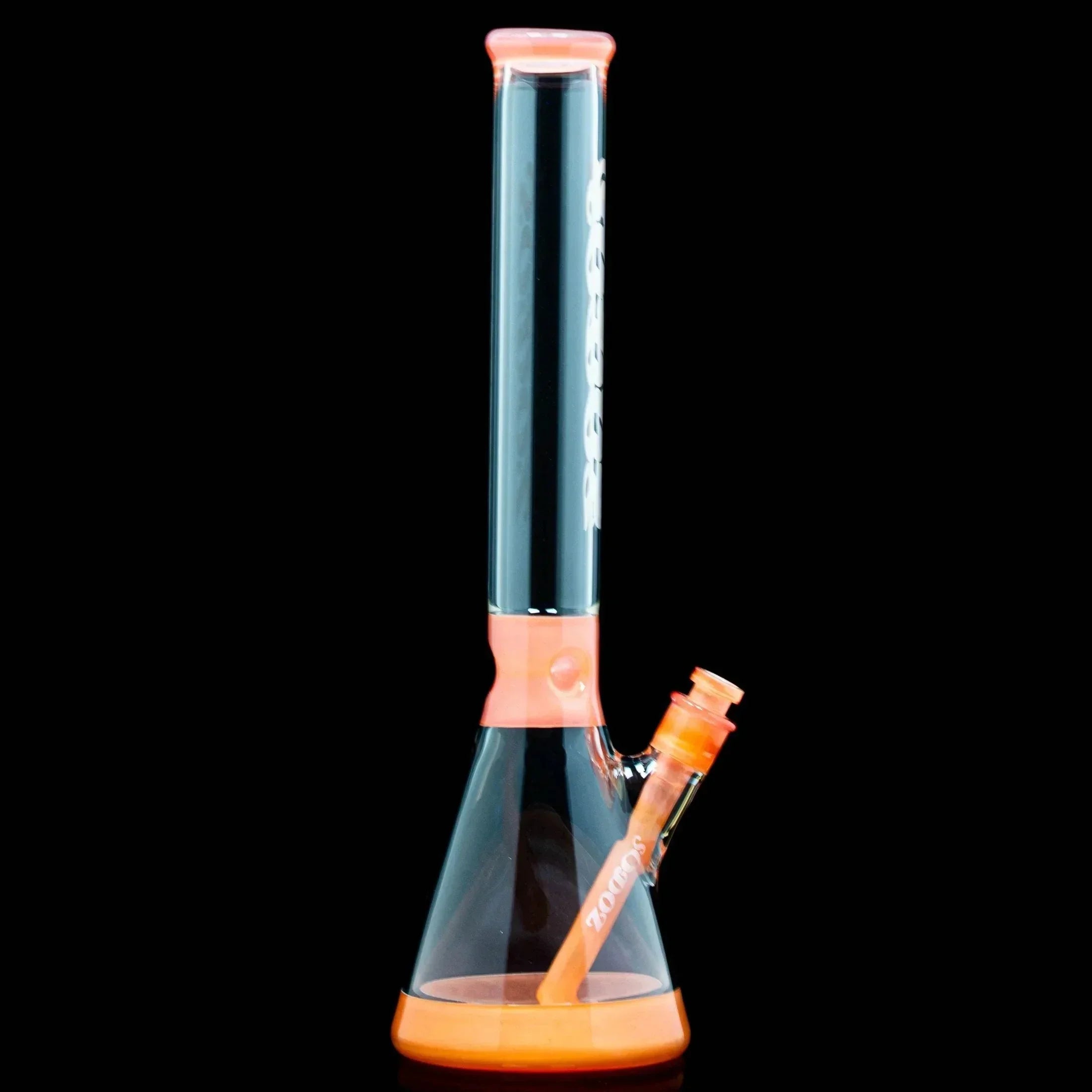 Peach satin beaker glass water pipe with clear chamber and orange accents on black background