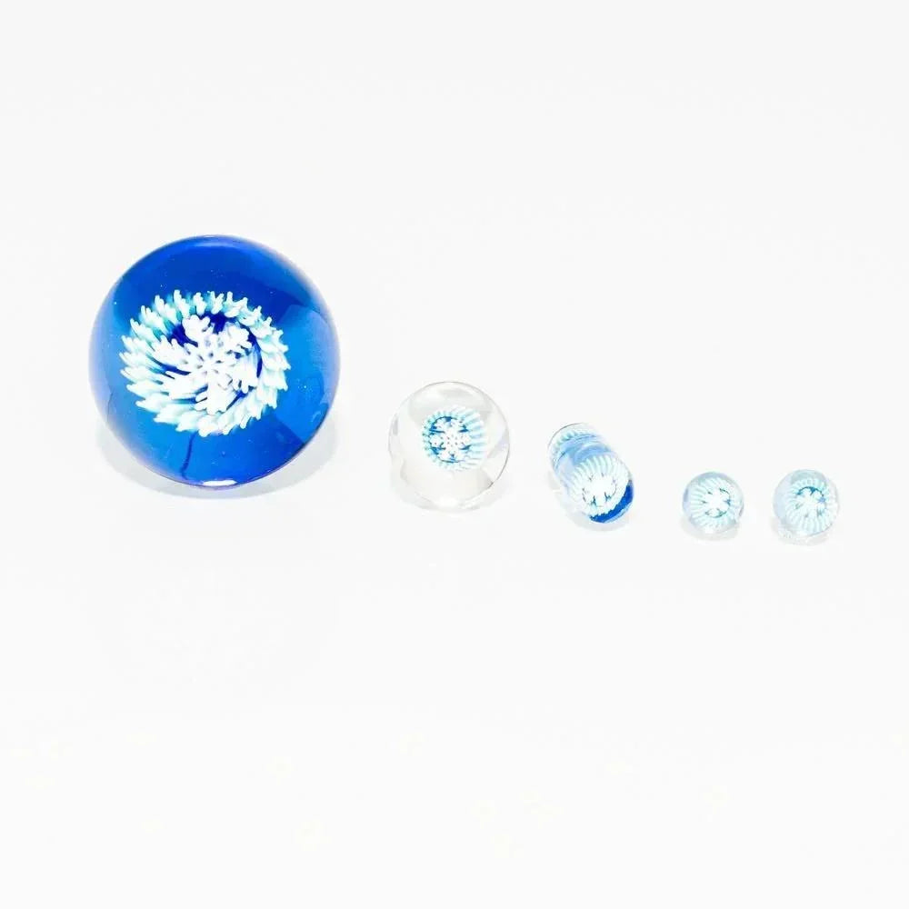 Five-piece glass slurper set with snowflake pattern in blue and clear designs