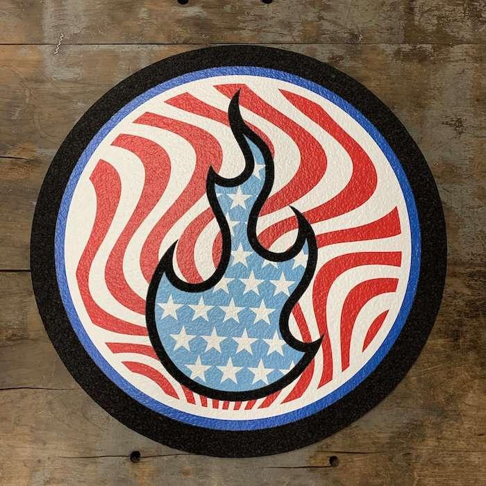 Patriotic flame design with American flag stars and stripes on circular mat