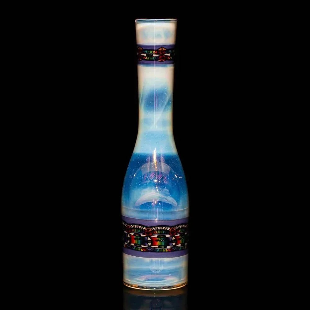 Iridescent glass sake bottle with colorful patterned bands on a black background