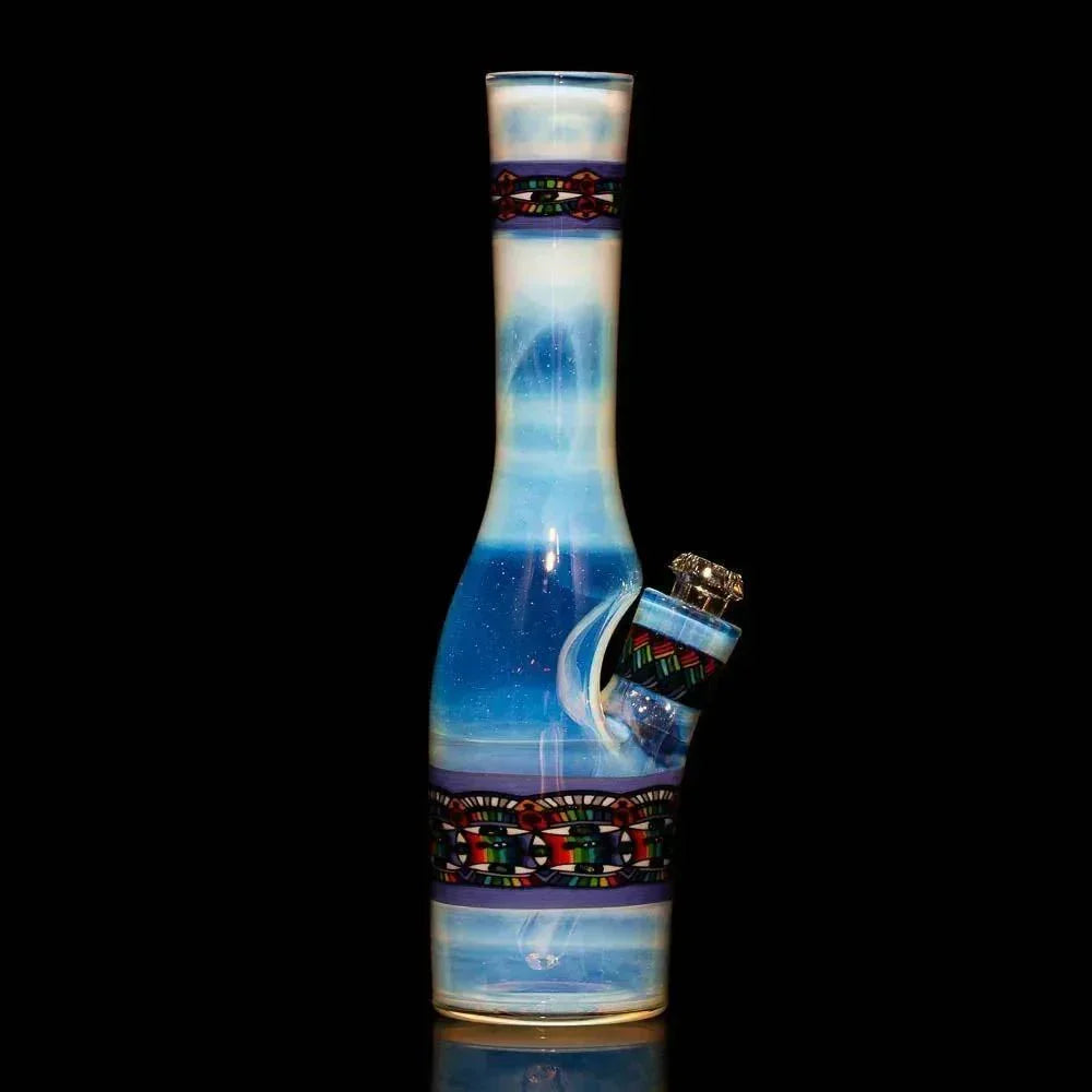 Blue and white glass water pipe with colorful geometric accents, displayed on black background