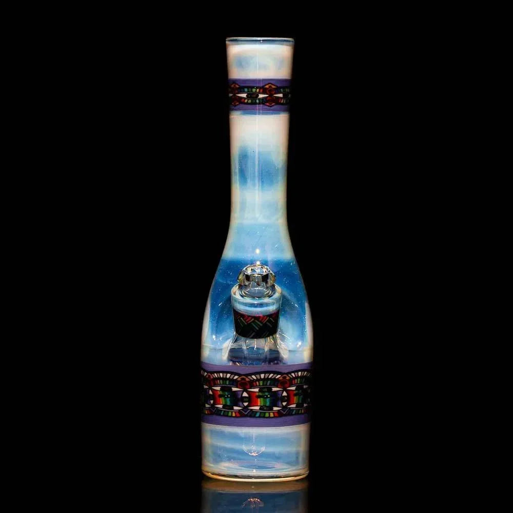 Handcrafted glass water pipe with blue and white hues and colorful geometric accents