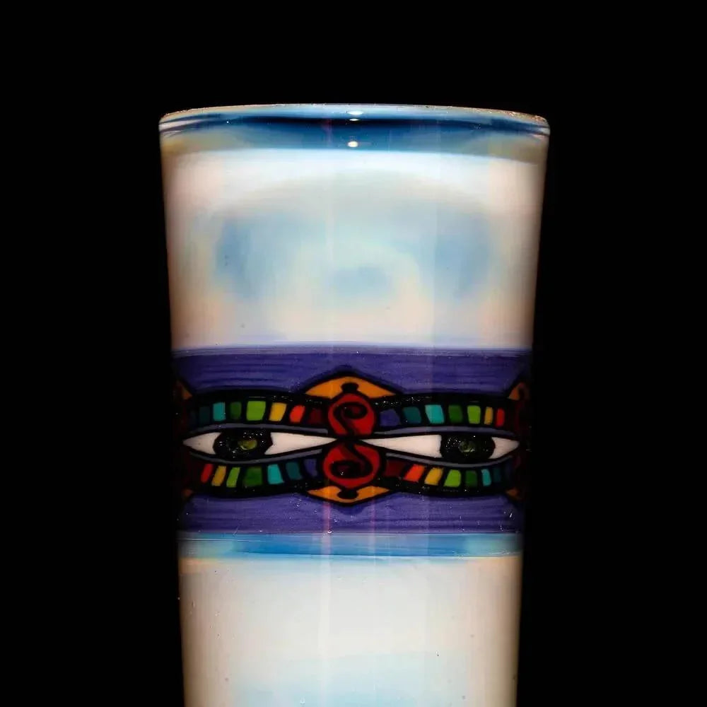 Hand-blown glass bottle with blue and white tones, featuring colorful eye pattern detail.